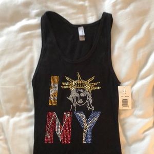 I love NY tank. Never worn. Tag attached. Med